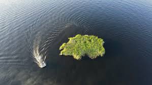 muskegon lake sees floating island form after high water erosion muskegon lake sees floating island form