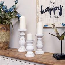 It is the place we accumulate to warm our hands and our feet and our souls. Home Decor Mantle Decor Centerpieces For Fireplace Home Decor Wood Pillar Candle Stand Nikky Home Candle Holder Set Of 3 Living Or Dining Room Table Distressed White Candles Holders