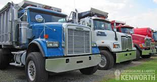 tri axle dump truck vs quad axle dump