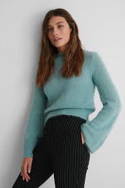 A sweater, also called a jumper in british and australian english, and a windcheater in parts of australia, is a piece of clothing, typically with long sleeves, made of knitted or crocheted material. Hairy Knit Sweater Blue Na Kd Com