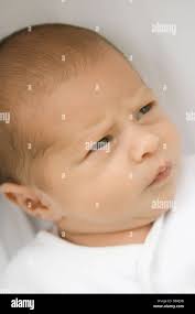 Baby cry cross hi-res stock photography and images