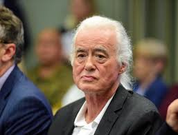 Robbie Williams and Led Zeppelin guitarist fight over plans for Warrington  artist's former home