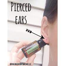 Geeez Can I Just Find One Pair Of Earrings That Don T Bother My Ears At Least I Have My Melaleu Essential Oils Cleaning Essential Oil Recipes Essential Oils
