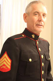 My Son, me upper right, my Great Nephew in the Marine Corps Dress Blues and  last pitcher is my son, with out his hat, with some of his other unit  members. Happy