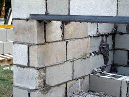 Building outdoor fireplace with cinder block. How To Build A Stone Pizza Oven How Tos Diy