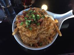 Putin calls trump an 'extraordinary individual,' biden, a 'career man'. The Vladimir Poutine Fries Cheese Curds Small Pierogies And A Spicy Meat Gravy Yum Picture Of Hopcat Madison Tripadvisor