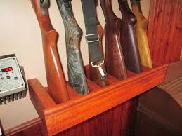 Do wall hangers come with safety features? Vertical Wooden Wall Gun Racks Gun Rack And Safe Supply