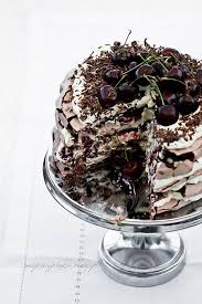 The Traditional Cake Pom Pom Black Forest In The Form Of A Beige Dessert Very Soft Creamy And Crunchy From The Meringue Meringue Cake Desserts Cake Recipes