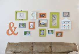 How many free gallery wall ideas are there? Colorful Family Room Gallery Wall The Happy Scraps