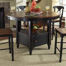 Knocbel farmhouse counter height bar table, kitchen dining room wooden round dining table with 2 drop leaves, stemware rack & open storage compartment, 40 dia x 36 h (cream) 5.0 out of 5 stars 1 $229.99 $ 229. A America Bri British Isles 52 In Round Counter Height Dining Table With Lazy Susan Storage Base High Top Table Kitchen Pub Table Sets High Top Tables