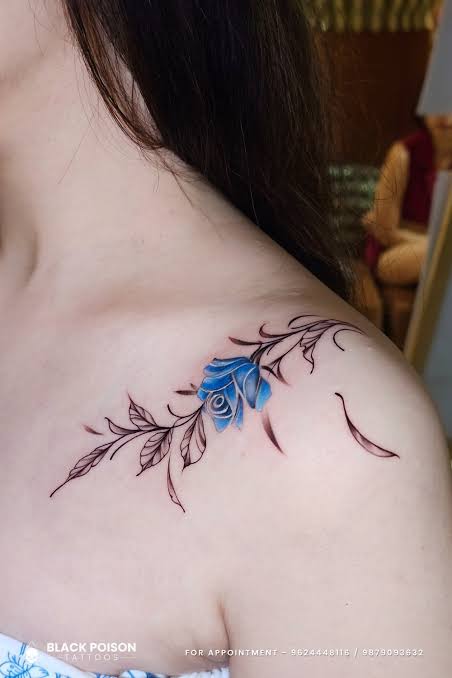 Blue Rose Collarbone Tattoo with Fine Line Detailing