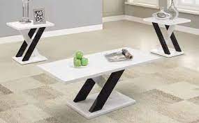 If your room is busy with prints and patterns, choose a wooden table in a dark tone to balance out the look. Living Room Occasional Sets Contemporary White Three Piece Table Set 701011 Three Pack Table Sets Furniture Factory