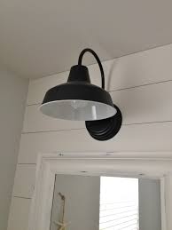 Not only was this an easy build, it's more affordable than anything we could find in stores and a whole lot more cute! Barn Wall Sconce Lends Farmhouse Look To Powder Room Remake Inspiration Barn Light Electric