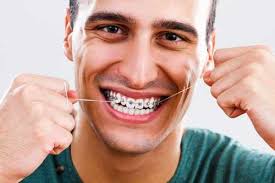 Use waxed wire if possible. Ways To Floss With Braces