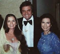 June Carter Cash, Johnny Cash and Loretta Lynn.