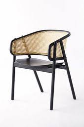 A comfortable armchair is an essential respite in any l. Woven Cane Rattan Accent Chair With Black Frame Modern Cane Furniture The Seasonal Edit Spring 2019 The Sav Rattan Furniture Woven Furniture Furniture