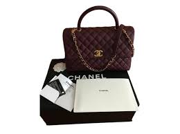 Explore the full range of fashion handbags and find your favorite pieces on the chanel website. Chanel Chanel Coco Handle Medium Bag Burgundy Caviar Lizard Gold New Handbags Exotic Leather Dark Red Ref 58069 Joli Closet