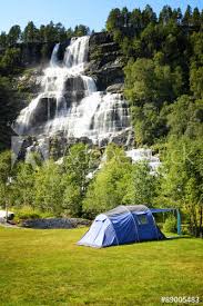 Also called trollafossen) is a waterfall in voss municipality in vestland county, norway. Camping Near Tvindefossen Waterfall Norway Stock Foto Adobe Stock