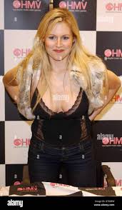 Celebrity 1 2 half length smiling cleavage music abi titmuss hi-res stock  photography and images - Alamy