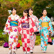 KYOTO, JAPAN - NOVEMBER 7, 2017: Group Of Girls In A Kimono On A City  Street. Close-up Stock Photo, Picture and Royalty Free Image. Image  101834148.