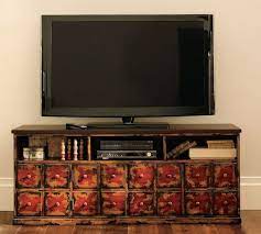 I certainly could have placed all the media components on the bottom shelf, but my wee ones are inexplicably drawn to flashing lights and buttons, so i decided to hide them away, out of. Andover Media Console Weathered Red Finish Pottery Barn Pottery Barn Media Console Media Console Fireplace Entertainment Center