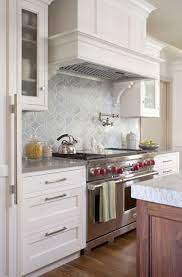 The elegant glass and marble mix rhomboid design backsplash tile. 83 Exciting Kitchen Backsplash Trends Luxury Home Remodeling Sebring Design Build