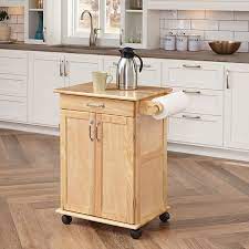 Home styles kitchen island is constructed of solid hardwoods and engineered wood with a rich black finish with a distressed oak finished top for an aged look. Amazon Com Paneled Door Kitchen Cart With Natural Finish By Home Styles Kitchen Islands Carts