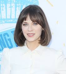Zooey Deschanel With Curtain Bangs In 2020 Medium Length Hair With Layers Above Shoulder Length Hair Zooey Deschanel Hair