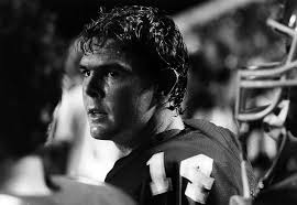 Here is John Holman rolling out to pass against Southeastern in Malone  Stadium