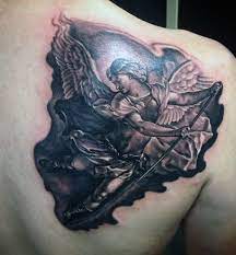 I do have an archangel name written in enochian on my wrist, which to some people is enough like a sigil to be a thing, i've had it for some y. Black Ink Archangel Michael Tattoo On Man Right Back Shoulder