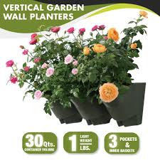 There is also a new trend of indoor vertical gardens catching up big time, which literally means to grow plants on the walls vertically. Worth Garden 18 In Self Watering 3 Pockets Vertical Wall Garden Plastic Planters 4190 The Home Depot