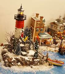 Shop carole towne peckham's lighthouse lighted musical in the christmas villages department at lowe's.com. Christmas Village 2015 Rock Point Lighthouse Christmas Village Display Christmas Villages Christmas Village