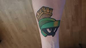 Hi~ my name is roxanne, the chief editor from taiwan tattoo magazine, our team has been working out the topic of cartoon, and visited your photo for information research. Marvin The Martian Tattoo