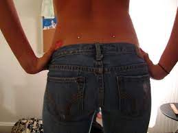 I Would Love To Get This Done Dermal Piercing Back Dimple Piercings Back Piercings