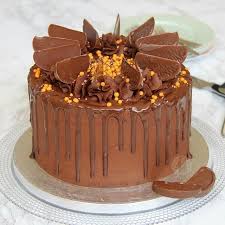Happy birthday chocolate hamper £23.50; Custard Cream Cupcakes Jane S Patisserie Orange Chocolate Cake Terrys Chocolate Orange Cake Drip Cakes
