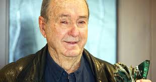 A boy watches war begin