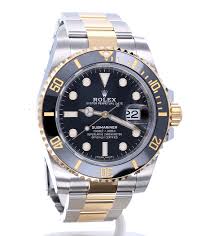 Gold watch of the famous roler brand. Rolex Oyster Perpetual Submariner Gold Steel Black Dial 40 Mm New 2020 Kleen Edelmetalen