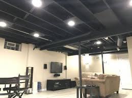 Recessed lighting is installed between the ceiling joists using recessed lighting housing. Basement Waterproofing Unfinished Basement Ceiling Exposed Basement Ceiling Black Basement Ceiling
