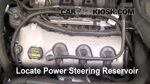 The location of the reservoir differs. Check Power Steering Level Ford Taurus 2010 2019 2011 Ford Taurus Sel 3 5l V6