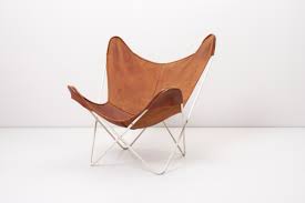 Inspired by the slender and delicate legs of a deer, the deer armchair is an elegantly modern upholstered dining. Butterfly Chair In Original Leather By Knoll International
