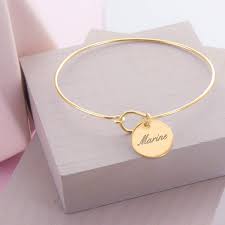Une idée de cadeau idéal pour femme et homme. Bracelet Jonc Fil Medaille A Personnaliser