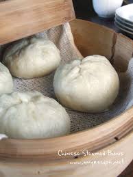 In a large mixing bowl or mixer with a dough hook attachment, completely dissolve yeast and sugar in lukewarm water. How To Make Chinese Steamed Buns Baozi Steamed Buns With Chicken And Chives Recipe Steamed Buns With Anko Bao Bau Nunu Pow Pau