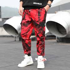 That also might explain why cargo pants are seemingly everywhere these days. Red Camouflage Pants Men Multi Pocket Hip Hop Cargo Trousers Streetwear Sweatpants Cotton Male Casual Fashion Loose Jogger Pant Black Buy At The Price Of 28 96 In Dhgate Com Imall Com