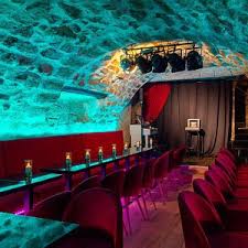 Its funky red building dominating boulevard de clichy, in the pigalle neighborhood, is one of paris's icons. The 10 Best Paris Cabarets With Photos Tripadvisor