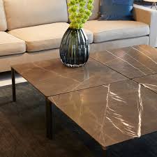 It makes the perfect perch for decorative serving trays or even board games for game nights with friends and family. Piloti 6750 Stone Coffee Table Great Dane