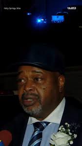 Video footage shows the moment a man, identified as Charles Edward Burrage,  pointed a gun at a father and his children