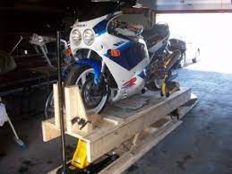 A motorcycle lift table enables you to service your bike comfortably. Homemade Wooden Motorcycle Lift Homemadetools Net