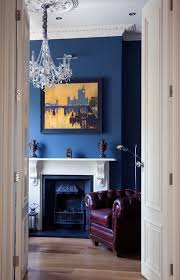 Black And White Fireplace Wall White Fireplace Mantel With Standard Height A Beautiful Painting With Black Frame As Wall Art Victorian Living Room Brown And Blue Living Room Blue Living Room