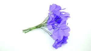 The bright colors will lift your spirits when the this paper flower craft project works well as either home decor or as a photo backdrop. 3 Ways To Make Tissue Paper Flowers Wikihow