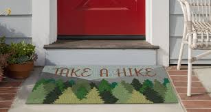 Many modern doors run close to the floor. Take A Hike Rug Plushrugs